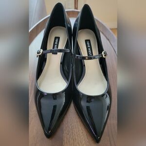 Black patent leather Mary Jane shoes